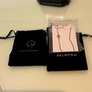 Peloton Necklace and Peloton Ring too add a touch of class to any wardrobe .